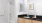a bathroom with a black countertop