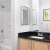 a bathroom with a black countertop