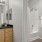 a bathroom with a tub sink and toilet