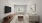 a living room with a tv and couches