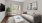 a living room with a couch and a table